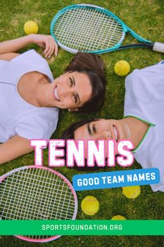 two women laying on the grass with tennis rackets and balls in front of them