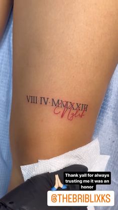 a woman's thigh with the words vilivi moxvi on it