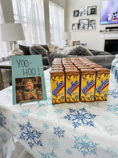 three boxes of chocolate sitting on top of a table next to a sign that says yo - hoo