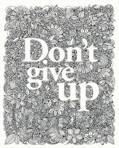 the words don't give up written in black and white on a floral background