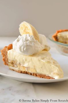 a slice of banana cream pie on a white plate