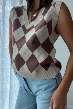 | V-Neck Argyle Knit Vest  | 50% Viscose, 30% Nylon, 20% Polyester   * MODEL IS 5'7″ AND IS WEARING A SMALL. Sweater Vest And Jeans, Girl Activities, V Neck Sweater Vest, Pinterest Christmas, Outfits Minimalist, Worn Jeans, Argyle Sweater Vest, Activities For Girls, Sweater Vests