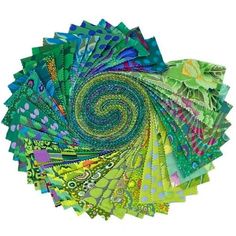 many different colored papers are arranged in the shape of a spiral, on a white background