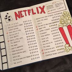 an open book with a movie schedule on the front and back cover that says netflix