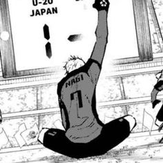 an anime character is sitting on the ground with his arms in the air and one hand up