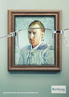 an image of a man with glasses hanging on the wall above it's eyeglasses