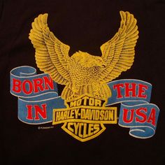 an eagle with the words born in the usa on it's chest and back