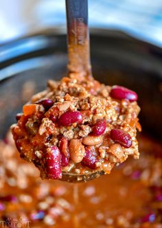 a spoon full of chili and oatmeal in a crock pot with text overlay