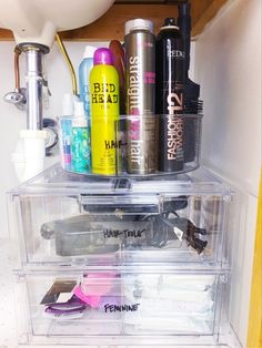 the inside of a refrigerator filled with lots of different types of hair products and other items