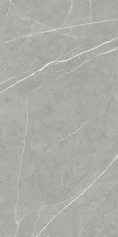 a gray marble textured surface with white lines