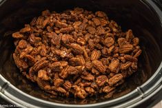 pecans in the slow cooker ready to be cooked for dinner or desserts