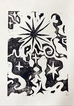 a black and white drawing with stars on it