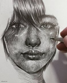 a pencil drawing of a woman's face