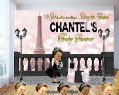 a group of dolls standing next to each other in front of a wall with the words chanel's baby shower