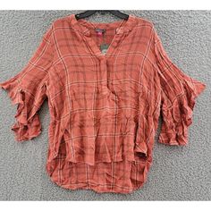 Vince Camuto Ruffled Sleeve Top Women'S L Apple Red Plaid Pullover Style V-Neck Vince Camuto Ruffled Sleeve Top Women's L Apple Red Plaid Pullover Style V-Neck Retail $79.00 Elevate Your Casual Wardrobe With This Stylish Vince Camuto Ruffled Sleeve Top In Apple Red Plaid. The Pullover Style Blouse Features A Flattering V-Neckline And Collarless Design, Making It Perfect For Any Occasion. The Flutter Sleeves And Breathable Blended Fabric Add A Touch Of Femininity And Comfort, While The Elbow Plaid V-neck Tops For Fall, Spring Plaid V-neck Blouse, Fall V-neck Ruffled Tops, Trendy Plaid V-neck Top, Plaid V-neck Blouse For Work, Plaid V-neck Blouse For Fall, Casual Plaid Blouse With Ruffles, Fall Ruffled V-neck Tops, Fall Plaid Top With Ruffles