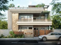 a car drives past a two story house