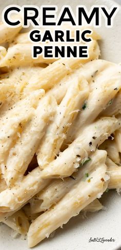 creamy garlic penne in a white bowl with text overlay that reads, creamy garlic penne