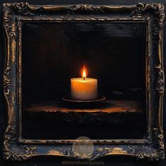 a lit candle sitting on top of a table in front of a framed painting with an ornate frame