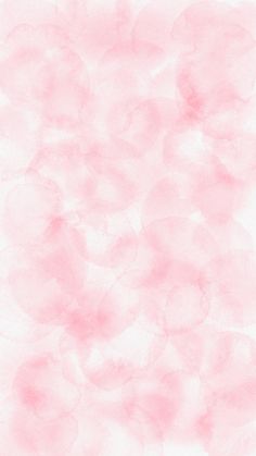 pink watercolor circles on white paper