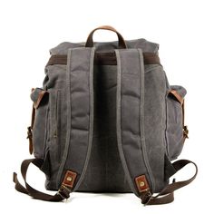 This waxed canvas flap backpack, padded laptop sleeve and straps, will sit comfortable over your back and keep all of your electronics within safe and secure from falling or slipping out. Heavy oil wax canvas and genuine leather trim, gives it a very stylish looking. 
 
This backpack will serve you well as a professional office business work bag, outdoor travel backpack, or college/high school rucksack. 
 Looking for a backpack that'll help you stand out from the crowd?  Our Large Waxed Canvas Vintage Backpack Mens are perfect for men who want to make a statement. With large capacity, you can carry your essentials, including books, documents, and personal items. And we've included a flap closure so you can be sure to keep your things safe and secure.  
 ITEM FEATURES  - 1 x Main Compartmen Large Backpack Travel, Flap Backpack, Backpack Decoration, Vintage Backpacks, Outdoor Backpacks, Medium Backpack, Backpack Travel Bag, Mobile Phone Bag, Canvas Backpack