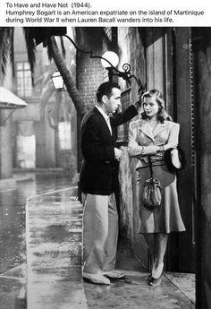 an old black and white photo of a man standing next to a woman on the street