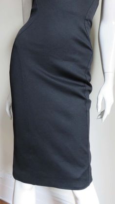 For Sale on 1stDibs - A fabulous black silk jersey strapless dress from Gianni Versace Couture. It is fitted with flattering seaming and the center back has functional on the Luxury Black Evening Skirt, Modern Black Pencil Skirt For Evening, Luxury Fitted Skirt For Gala, Black Cocktail Pencil Skirt, Luxury Fitted Cocktail Skirt, Elegant Fitted Black Pencil Skirt, Elegant Fitted Pencil Skirt For Evening, Sleek Fitted Evening Pencil Skirt, Modern Fitted Skirt For Evening