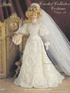 a barbie doll wearing a wedding dress and veil