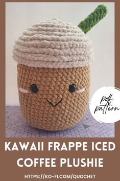 a crocheted coffee cup with a green leaf on top and the words kawaii