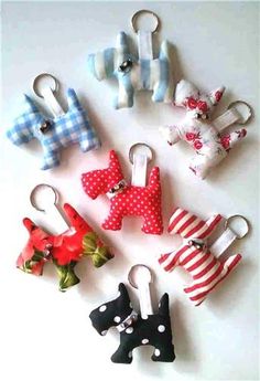 several different types of dog collars are arranged on a white surface with red and blue polka dots