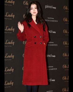 Han So-hee Red Wool Long Coat Exude confidence with our Han So-hee red trench coat. The bold color instantly grabs attention, while the detailed craftsmanship on this outerwear creates a sophisticated allure. The exterior is crafted using a top-quality wool, and the interior is made from premium viscose, ensuring unparalleled luxurious comfort and durability. Being versatile, this women's red coat can easily be paired with any outfit, instantly elevating your whole look. Ideal to be worn at formal events, business meetings, or on a date with your loved one, this outerwear is not only stylish but also practical, ensuring warmth and offering protection from winds and cold. The tailored structure creates a fitted silhouette, enhancing the structure of the wearer. And that’s not all! This oute Red Double-breasted Winter Outerwear, Collarless Leather Jacket, Red Jacket Leather, Celebrity Inspired Outfits, Ziva David, Wool Long Coat, Events Business, Blue Leather Jacket, Red Trench Coat