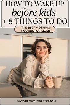 a woman sitting at a kitchen counter holding a coffee cup with the words how to wake up before kids and things to do