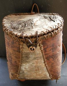 an old wooden box sitting on top of a table