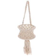 a macrame bag hanging from a rope