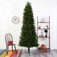 a christmas tree in a living room next to a chair