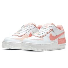 a white and pink nike air force sneakers