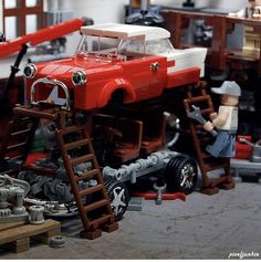 an assortment of toy cars and toys in a room