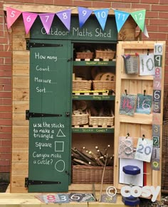 an outdoor market with lots of items for sale on the shelves and in front of it is a chalkboard sign that says happy new year