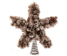 a decorative christmas tree topper on a white background