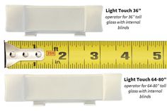 two white plastic rulers with measurements for each one