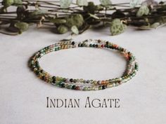 Indian Agate is the '𝗦𝘁𝗼𝗻𝗲 𝗼𝗳 𝗘𝘁𝗲𝗿𝗻𝗶𝘁𝘆' and is said to have the following properties: * Strengthens the body's connection to the earth * Brings luck and prosperity * Increases relaxation when meditating * Encourages emotional healing Delicately designed with a minimalist touch, these bracelets feature dainty 2mm round, smooth beads. Customise your necklace with our selection of boho-style charms, each meticulously handcrafted to order from 100% recycled sterling silver. Plus, you Yoga Necklace, Bead Creations, Indian Agate, Handmade Projects, Yoga Gifts, Necklace Minimalist, Green Crystal, Meditation Yoga, Beaded Choker