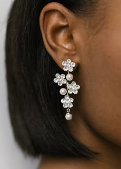 The Aria Earring gives you the best of both worlds: the sparkle of crystal flowers mixed with classic crystal pearl elements. Made by hand in New York City. Matric Dress, Wedding Jewelery, Luxury Hair Accessories, Pearl Headpiece, Crystal Flowers, Crystal Bridal Earrings, Jennifer Behr, Wedding Hair Makeup, Luxury Hair