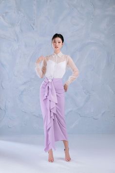 Lavender Sarong Ruffled Silk Midi Skirt | MEAN BLVD Elegant Draped Lined Skirt, Elegant Draped Pleated Skirt, Elegant Draped Party Skirt, Elegant Draped Skirt For Party, Elegant Draped Fitted Wrap Skirt, Pre-draped Long Skirt For Party, Elegant Skirt With Ruffles, Formal Asymmetrical Draped Ruffled Skirt, Elegant Draped Maxi Skirt For Spring