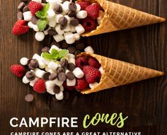 two cones filled with marshmallows, raspberries and chocolate chips on top of each other