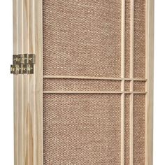 a wooden door with two handles and some wood slats on the front, behind which is a bamboo screen