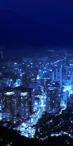 an aerial view of a city at night