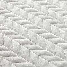 an up close view of a white mattress