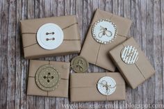 some brown wrapping paper with buttons and tags on them