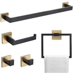 bathroom accessories including towel rack, toilet paper holder and tissue dispenser in gold / black