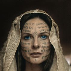 a woman with words all over her face