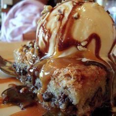 a desert with ice cream and chocolate sauce